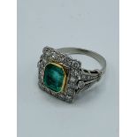 Emerald and diamond ring.