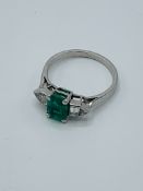 Art Deco style emerald and diamond ring.