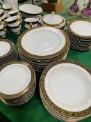 Sango 'Hampton' white and gold dinner set.