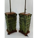 Pair of bronze height adjustable two bulb table lamps together with a small bronze table lamp.