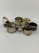 Quantity of antique sterling silver napkin rings 100gms.