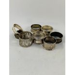 Quantity of antique sterling silver napkin rings 100gms.