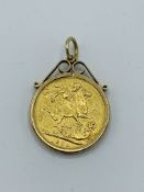 1889 gold half sovereign in 9ct gold pendant, 9.6gms