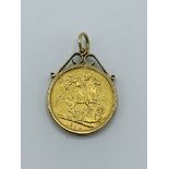 1889 gold half sovereign in 9ct gold pendant, 9.6gms