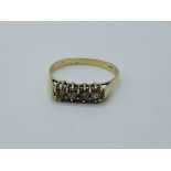 9ct gold and 4 diamond ring, 1.8gms