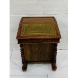Early 20th century mahogany Davenport with tooled leather slope and side drawers.