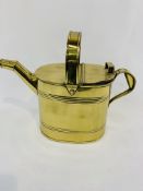 A Victorian Army and Navy Brass Watering Can, other brassware and a copper coaching horn.