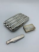 Hallmarked silver cigar case, Asprey's match box holder and Dunhill smoker's companion