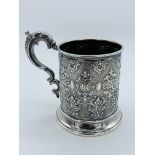 Small heavily repousse decorated silver tankard by Robert Hennell III