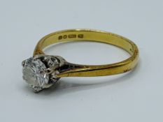 18ct gold and platinum solitaire ring