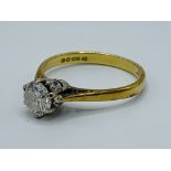 18ct gold and platinum solitaire ring