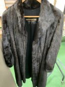 Black long fur coat from the Siberian Fur Store, Hong Kong.