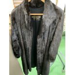 Black long fur coat from the Siberian Fur Store, Hong Kong.