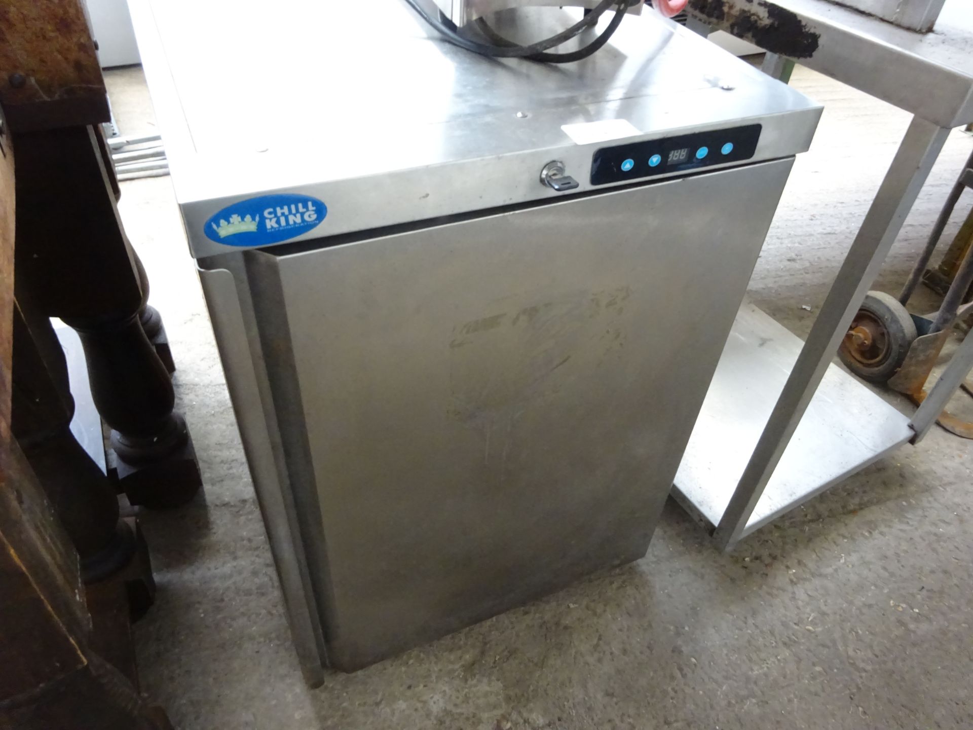 Stainless steel single door fridge.