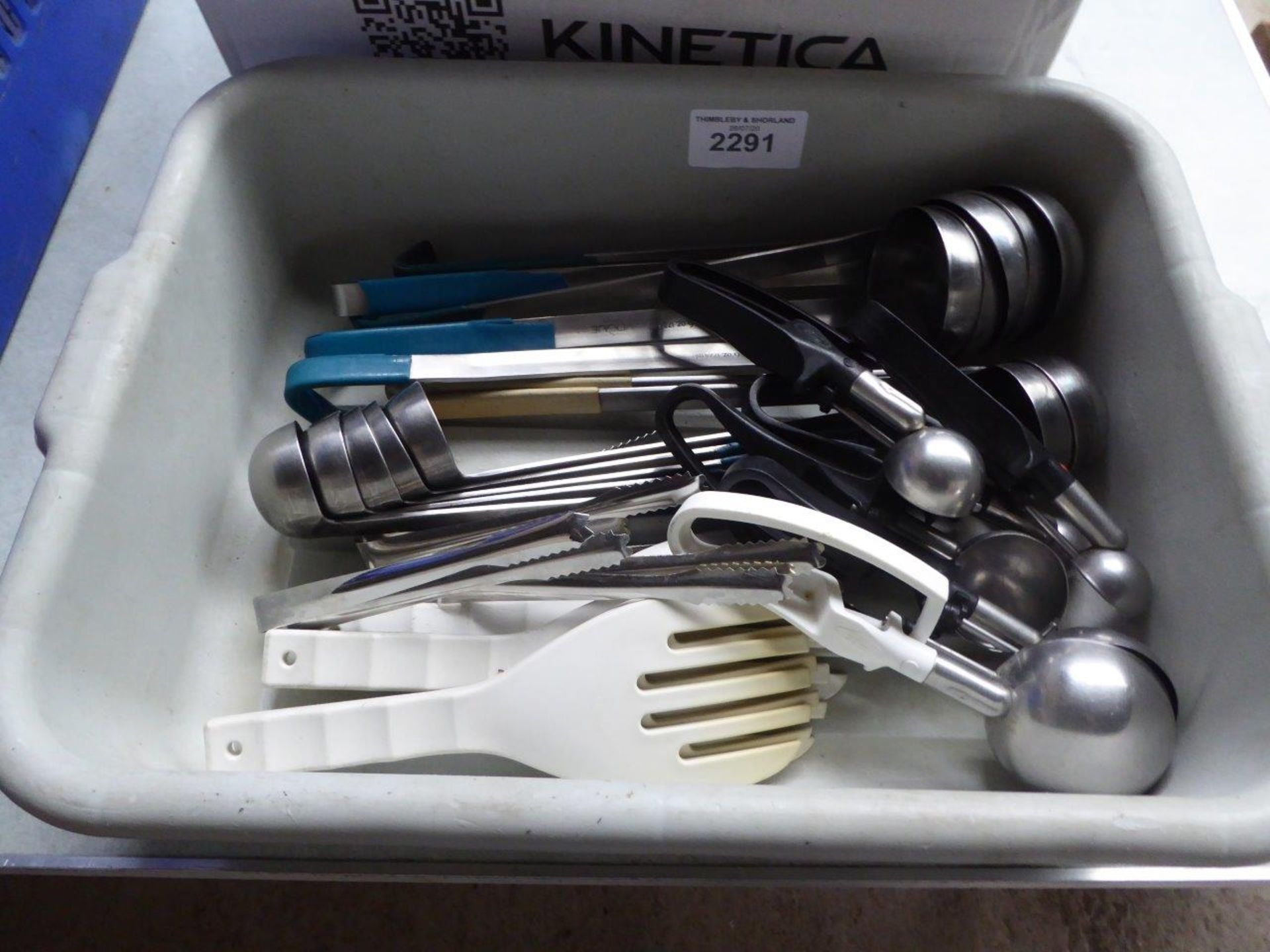 Assorted catering utensils.