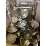 Box of boxed metal ware including silver plate candlesticks and goblets.