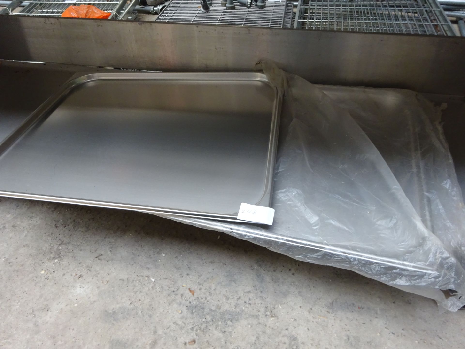 2 large stainless steel trays.