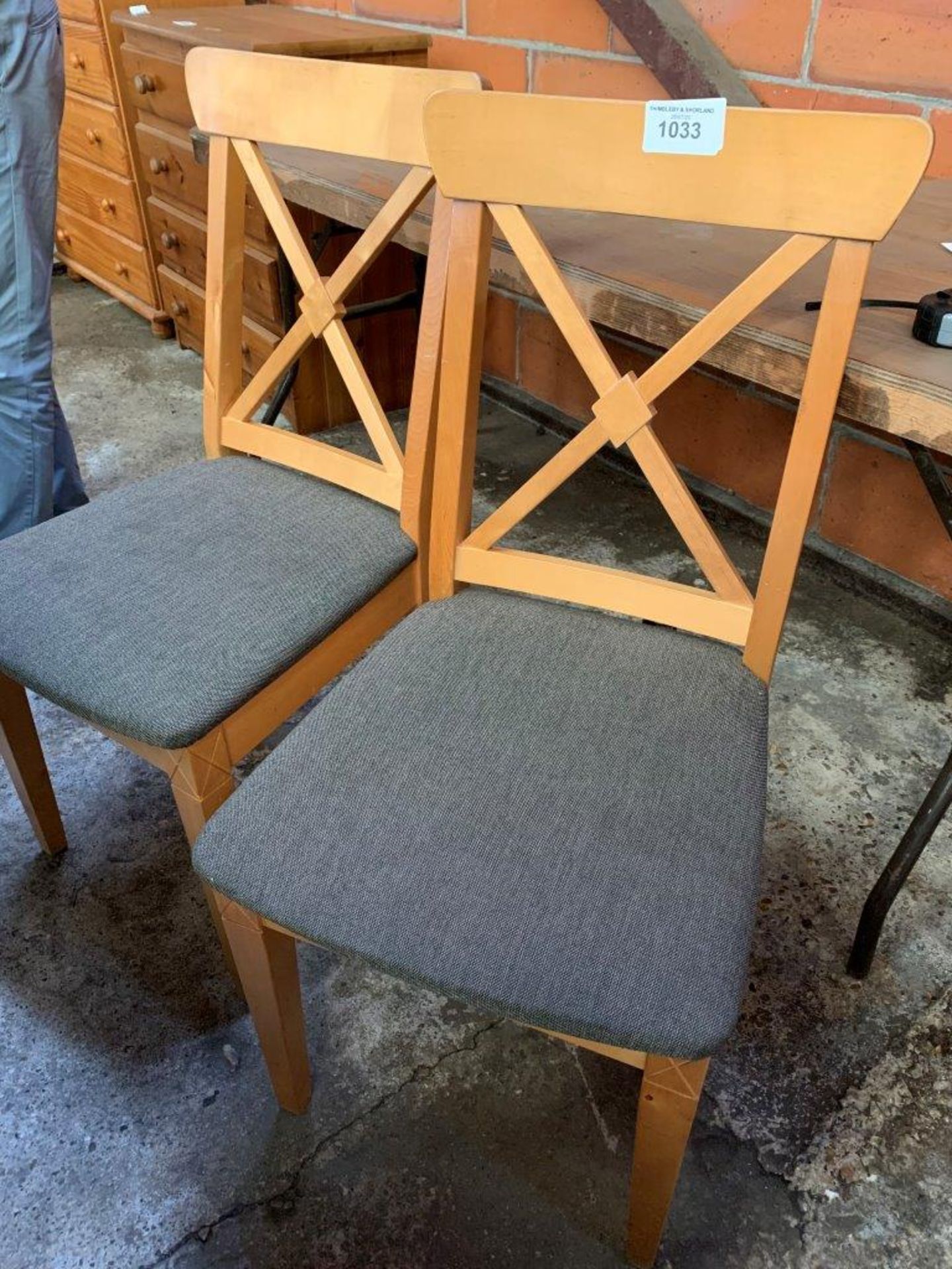 Two modern dining chairs.