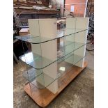 Glass shop display stand, on wheels.