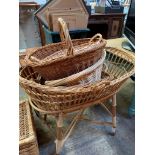 Wicker chest, crib and four baskets.