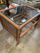 Rattan glass top coffee table.