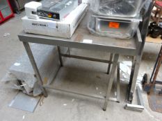 Stainless steel food preparation table.