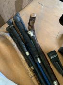 Quantity of old riding crops.