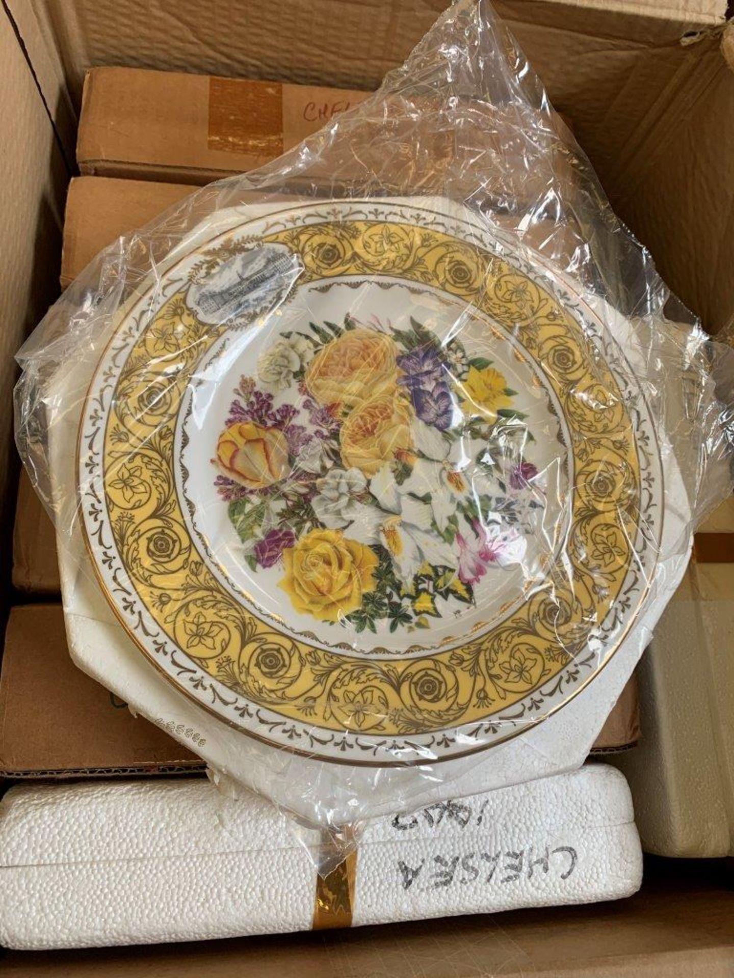 Box of 9 RHS Chelsea Flower Show Royal Doulton plates.