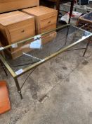 Brass framed glass top coffee table.