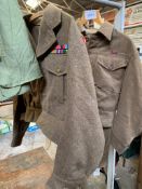 2 British Army battle dress tops, trousers, kit bag.