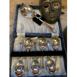 Brass coal bucket, brass mask and box of spoons.