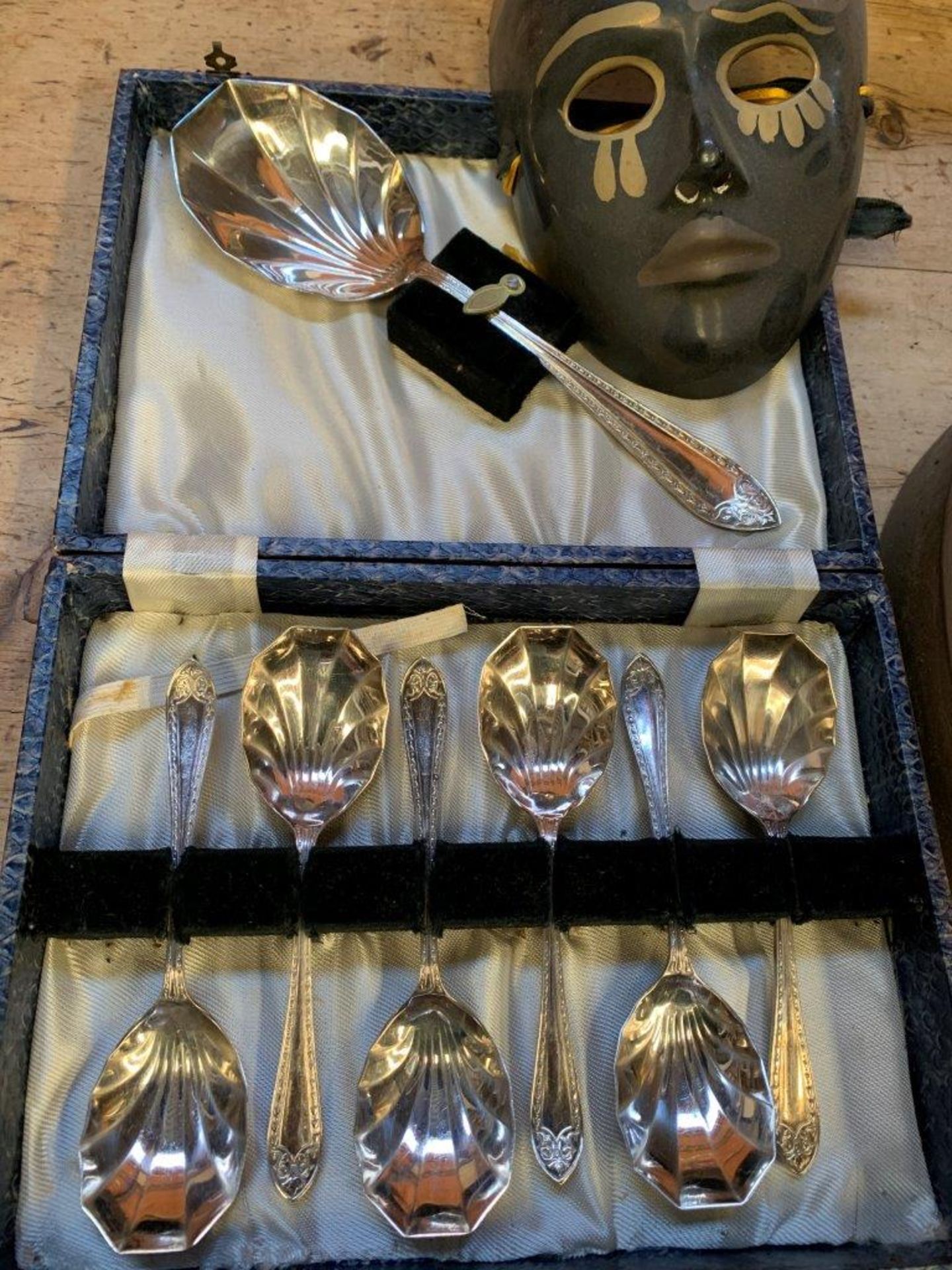 Brass coal bucket, brass mask and box of spoons.