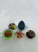Group of 5 small paperweights.