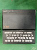 Sinclair ZX81 with power pack and program manual
