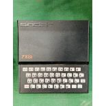 Sinclair ZX81 with power pack and program manual