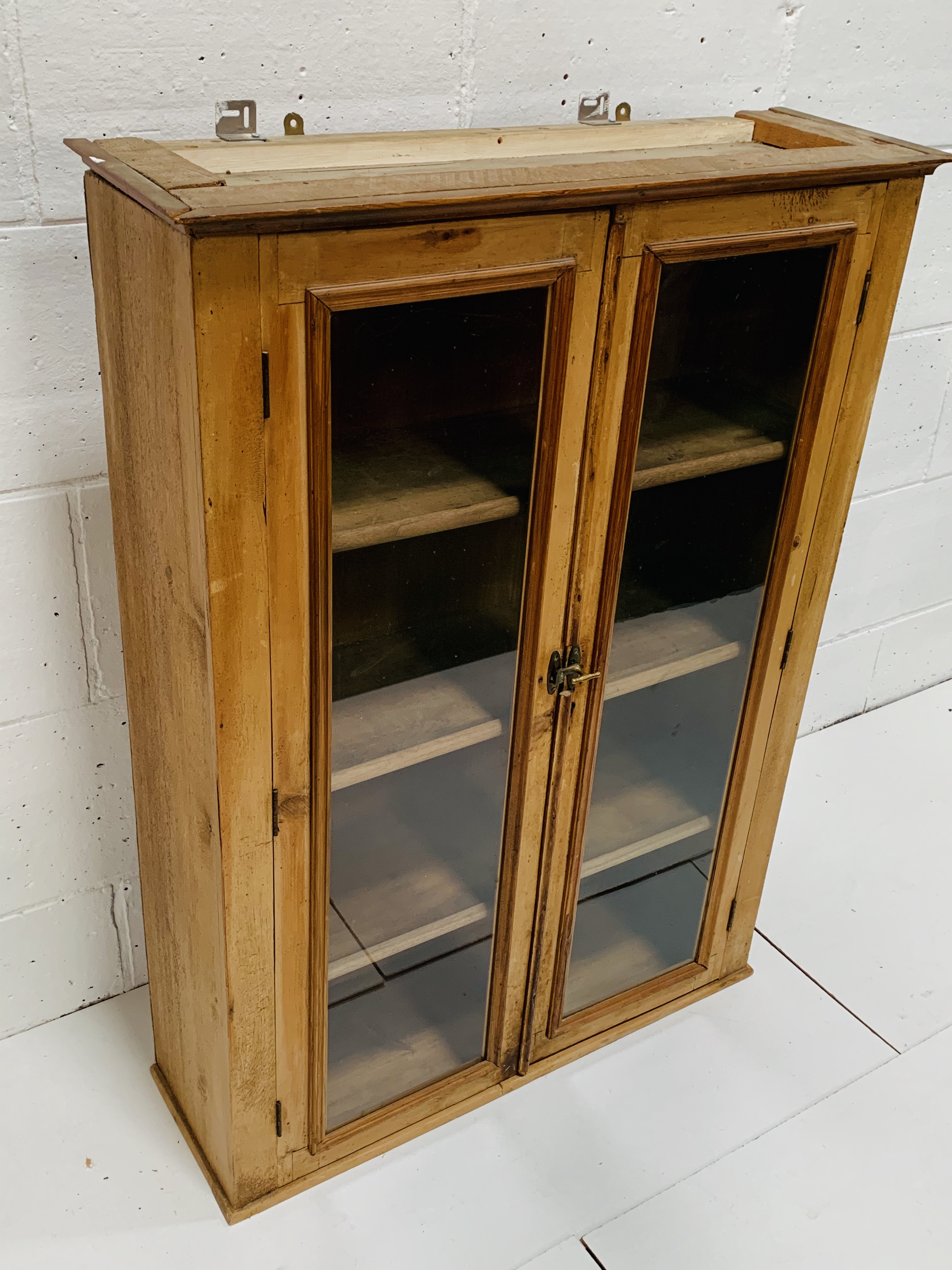 Pine wall mounted cupboard with glazed doors, 80 x 27 x 100cms. - Image 2 of 2