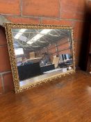 Gilt framed wall mirror, 79 x 59cms.