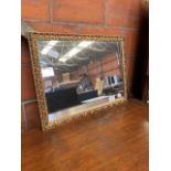 Gilt framed wall mirror, 79 x 59cms.