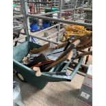 Plastic barrow containing shovels, picks, saws and galvanised gate furniture.