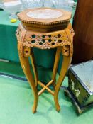Carved wood plant stand with marble top, and an oriental jardiniere