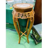 Carved wood plant stand with marble top, and an oriental jardiniere