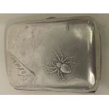 German 800 silver cigarette case with chased spider in web design to front.