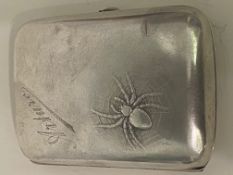 German 800 silver cigarette case with chased spider in web design to front.