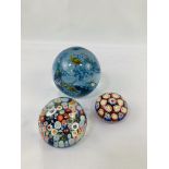 Three glass paperweights, 2 being Murano millefiori