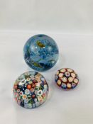 Three glass paperweights, 2 being Murano millefiori