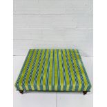 Large foot stool upholstered in turquoise and green stripes
