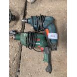 Bosch PSB650RE drill and a Black and Decker KD562 drill.