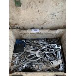 Metal box containing a quantity of spanners.