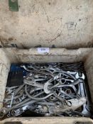 Metal box containing a quantity of spanners.