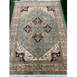 Green Hadiz rug, 140 x 190cms.